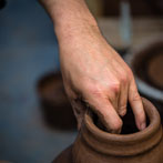 Doug Fitch and Hannah McAndrew making a jug for me